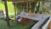 Relaxing Outdoor Lounge Area at Bali Backpacker Hostel