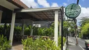 Tropical Cafe Exterior in Bali with Warung & Co Sign