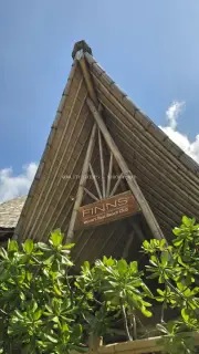 Finns Beach Club Bali Entrance with Unique Bamboo Architecture