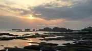 Dramatic Sunset over Tanah Lot Temple, Bali's Iconic Sea Temple