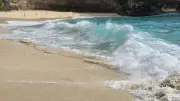 Turquoise Waves Crashing on Kelingking Beach Bali