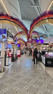 Bali Airport Terminal Duty-Free Shopping Corridor with Balinese Decor