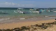 Bali Beach B-roll Footage: Traditional Jukung Boats on Pantai Bopel Shore
