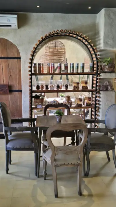 Rustic Cafe Interior with Artisan Products and Vintage Decor in Bali - stock photo