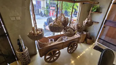 Artisan Bread Display in Rustic Bali Bakery Interior - stock photo