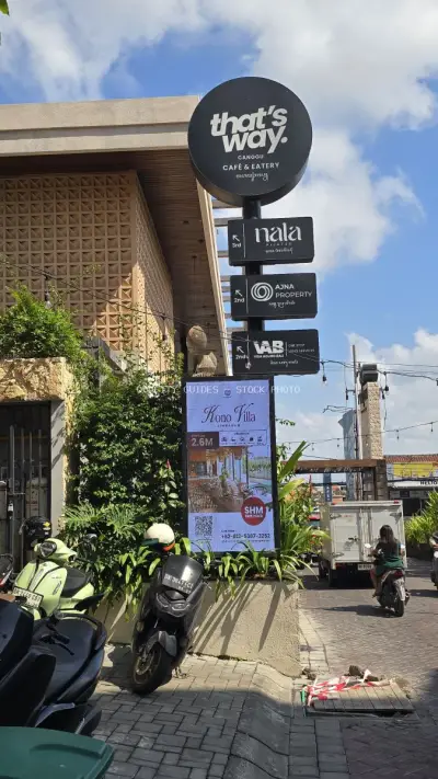 That's Way Canggu Cafe Signage and Vibrant Bali Street Scene - stock photo