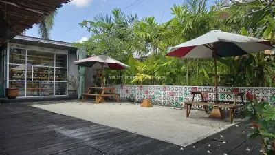 Relaxing Outdoor Cafe Seating Area in Tropical Bali Setting - stock photo