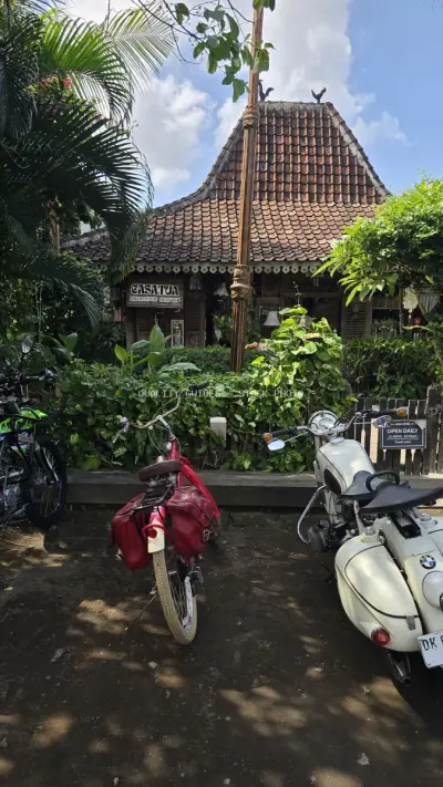 Casa Tua Canggu: Traditional Balinese Cafe with Vintage Motorcycles - stock photo