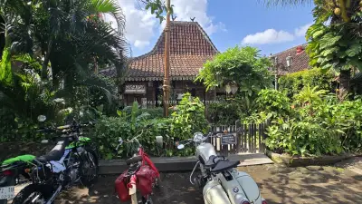 Traditional Balinese Architecture and Tropical Garden at Casa Tua Canggu - stock photo