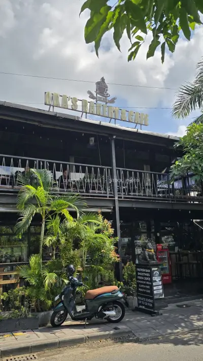 Oka's Bakery Cafe Exterior in Canggu Bali with Scooter - stock photo