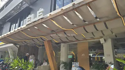 Modern ÉLÉ Restaurant Exterior in Bali with Outdoor Seating - stock photo