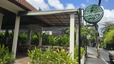 Tropical Cafe Exterior in Bali with Warung & Co Sign - stock photo