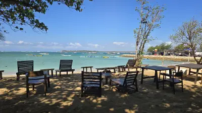 Mertasari Beach Bali: Idyllic Tropical Seascape with Empty Chairs - stock photo