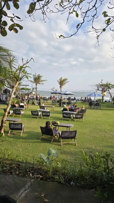 Relaxing Beach Club Scene in Bali with Ocean View - stock photo