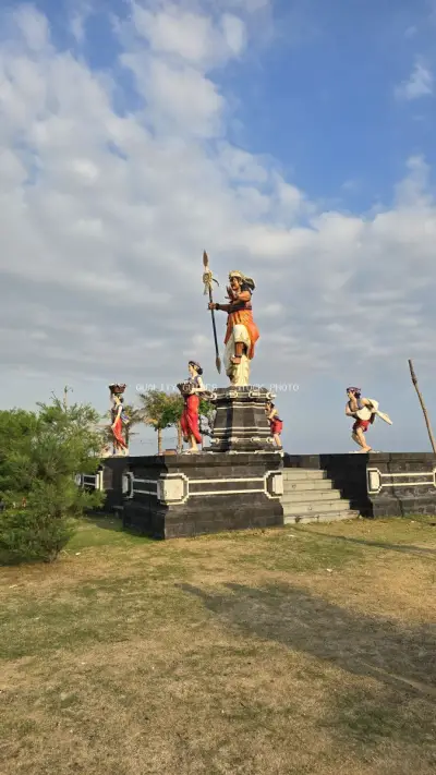 Balinese Cultural Monument at Seseh Beach Under Blue Sky - stock photo