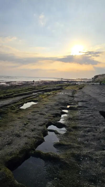 Golden Sunset Over Rocky Cemagi Beach Tidal Pools, Bali - stock photo