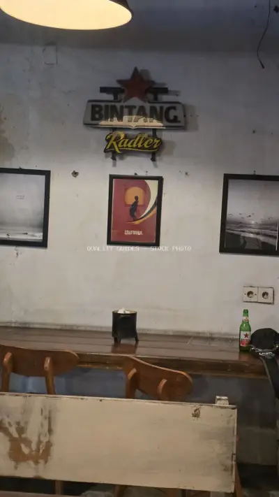 Casual Interior of a Balinese Cafe with Bintang Radler Sign - stock photo