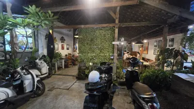 Evening Ambiance at a Rustic Open-Air Restaurant in Bali - stock photo