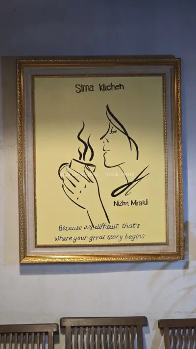Sima Kitchen Bali Artwork: Woman Enjoying Coffee with Inspirational Quote - stock photo
