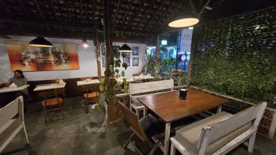 Cozy Bali Restaurant Interior at Sima Kitchen at Night - stock photo