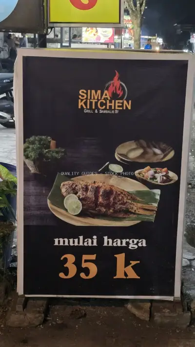 Sima Kitchen Restaurant Signboard with Grilled Fish Menu in Bali - stock photo