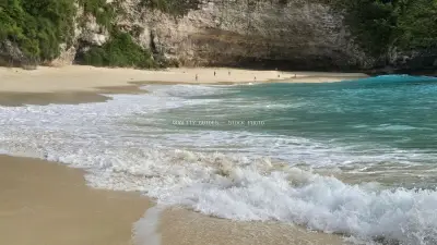 Kelingking Beach Bali Turquoise Waters Dramatic Cliffs - stock photo