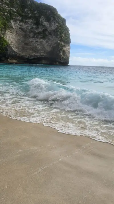 Kelingking Beach Bali Dramatic Cliff Waves Ocean - stock photo