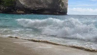 Kelingking Beach Bali Dramatic Cliffs Turquoise Waves - stock photo