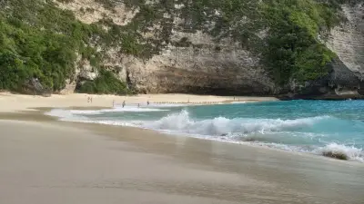 Kelingking Beach Bali Turquoise Waters Dramatic Cliffs - stock photo