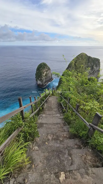 Kelingking Beach Clifftop Pathway Bali Ocean View - stock photo