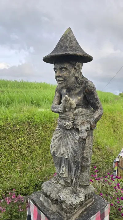 Traditional Stone Statue Jatiluwih Rice Terraces Bali - stock photo