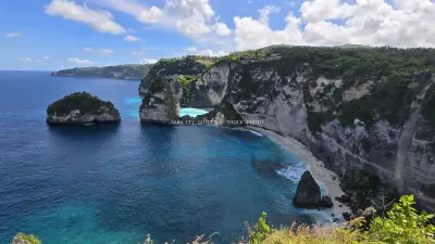 Diamond Beach Bali Limestone Cliffs Tropical Paradise - stock photo