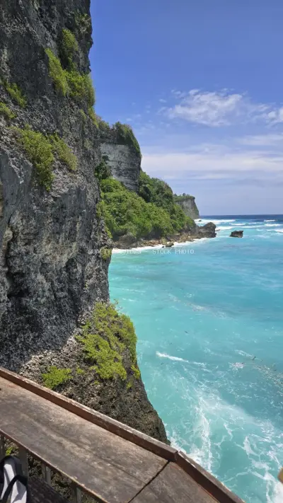 Dramatic Cliff View Turquoise Ocean Bali Beach - stock photo