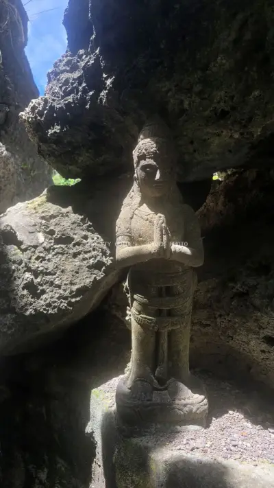Ancient Stone Statue in Uluwatu Cave, Bali Indonesia - stock photo