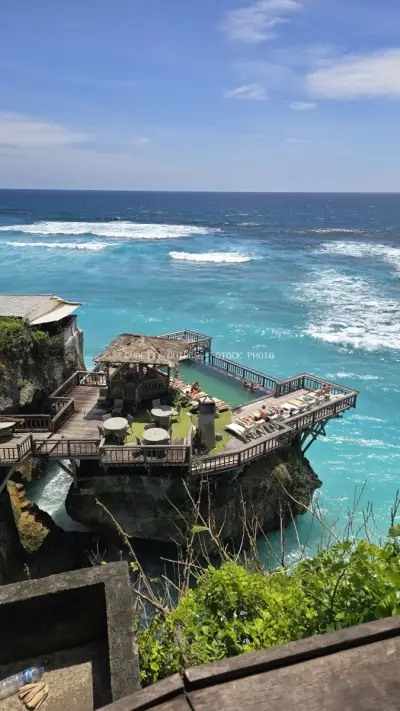 Suluban Beach Uluwatu Bali Clifftop Resort Pool - stock photo