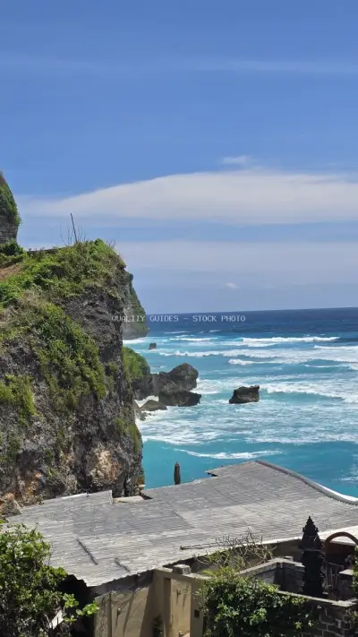 Clifftop Wooden Deck Overlooking Turquoise Ocean Waves Bali - stock photo