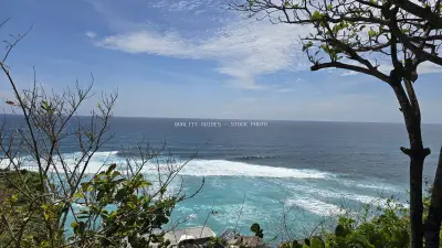 Suluban Uluwatu Beach Bali Coastal Cliffs Ocean View - stock photo