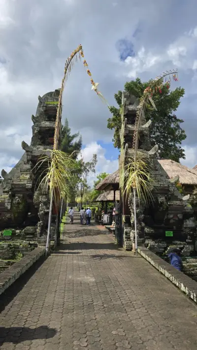 Taman Ayun Temple Bali Entrance Gate with Tourists - stock photo