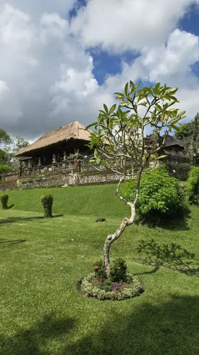 Taman Ayun Temple Bali with Tropical Garden and Sky - stock photo