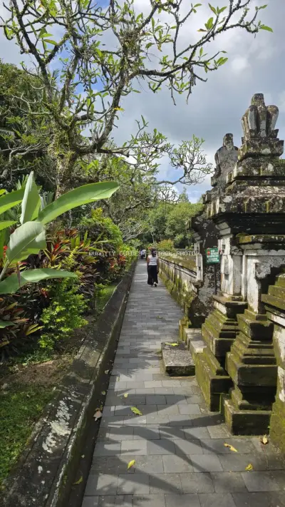 Taman Ayun Temple pathway with ancient stone architecture Bali - stock photo
