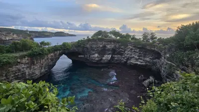 Broken Beach Bali Dramatic Coastal Rock Formation - stock photo