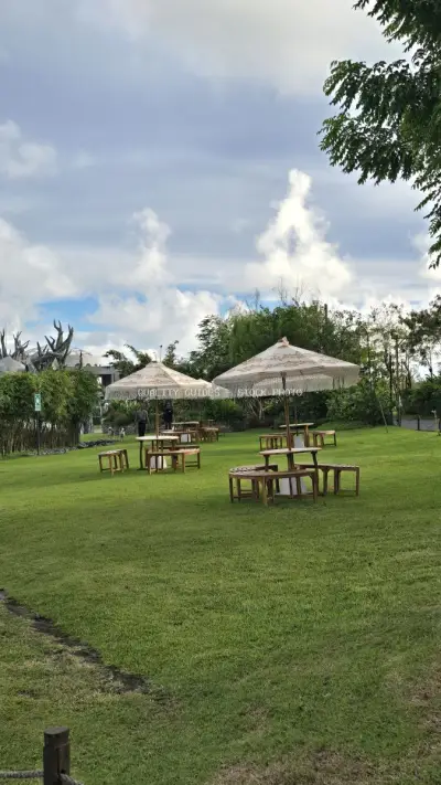 Tropical Garden Venue with Thatched Umbrellas Bali - stock photo