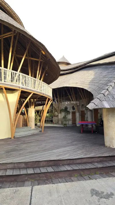 Modern Balinese Architecture Courtyard with Wooden Structures - stock photo