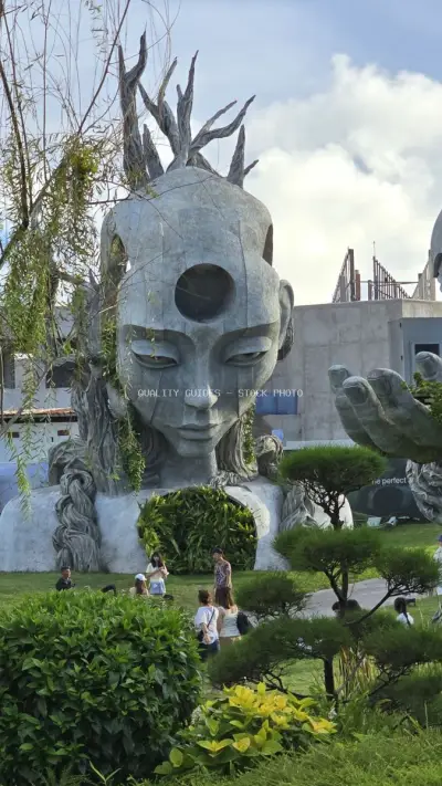 Surreal Stone Head Sculpture Bali Creative City Art Installation - stock photo
