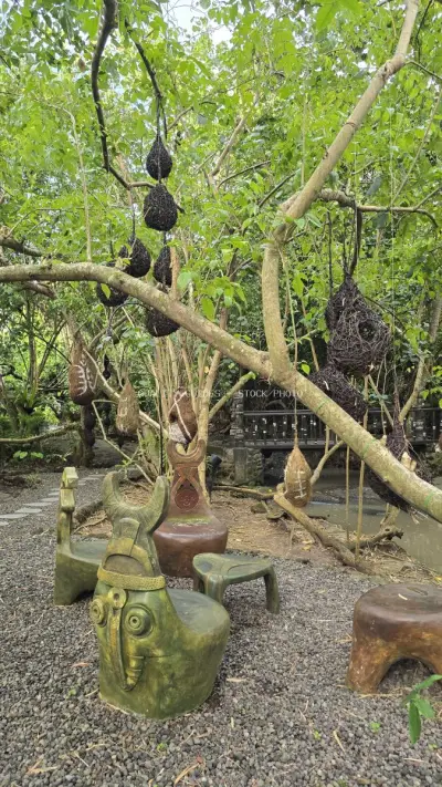 Balinese Garden Art Sculptures Tropical Canopy Nuanu - stock photo