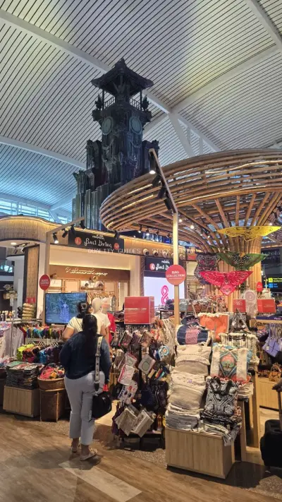Balinese Airport Souvenir Shop with Traditional Architecture - stock photo