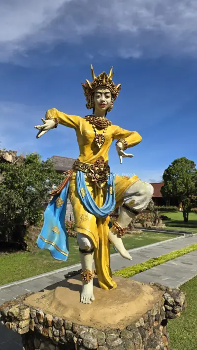 Golden Balinese Statue at Ulun Danu Beratan Temple - stock photo