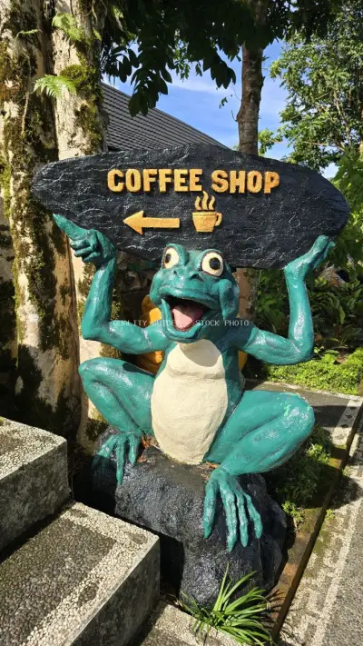 Whimsical Turquoise Frog Coffee Shop Sign Bali - stock photo