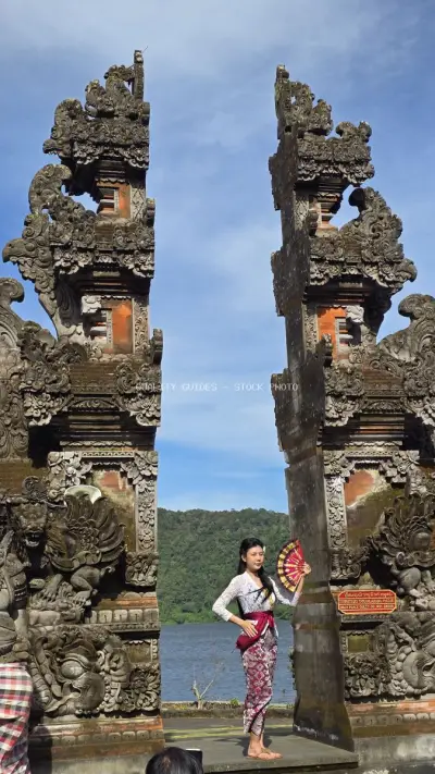 Woman at Ulun Danu Beratan Temple Bali Indonesia - stock photo