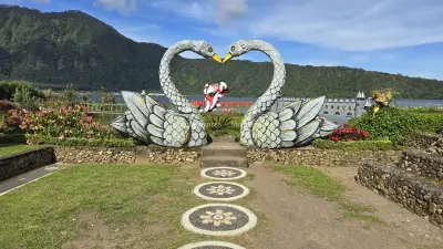 Ornamental Swan Sculpture at Ulun Danu Beratan Temple Bali - stock photo